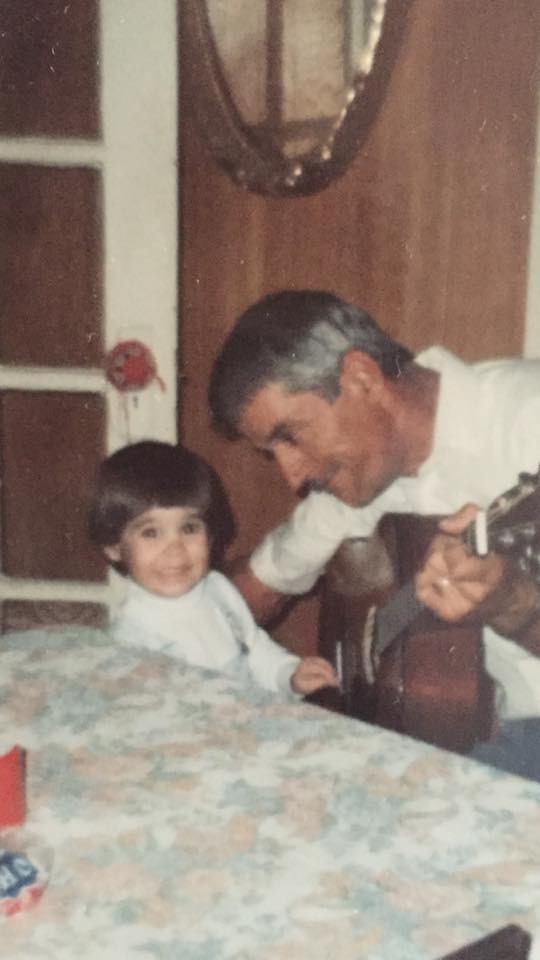 Me as a little one with my uncle at Grandma's house.  You can see the doorknob cozy there.